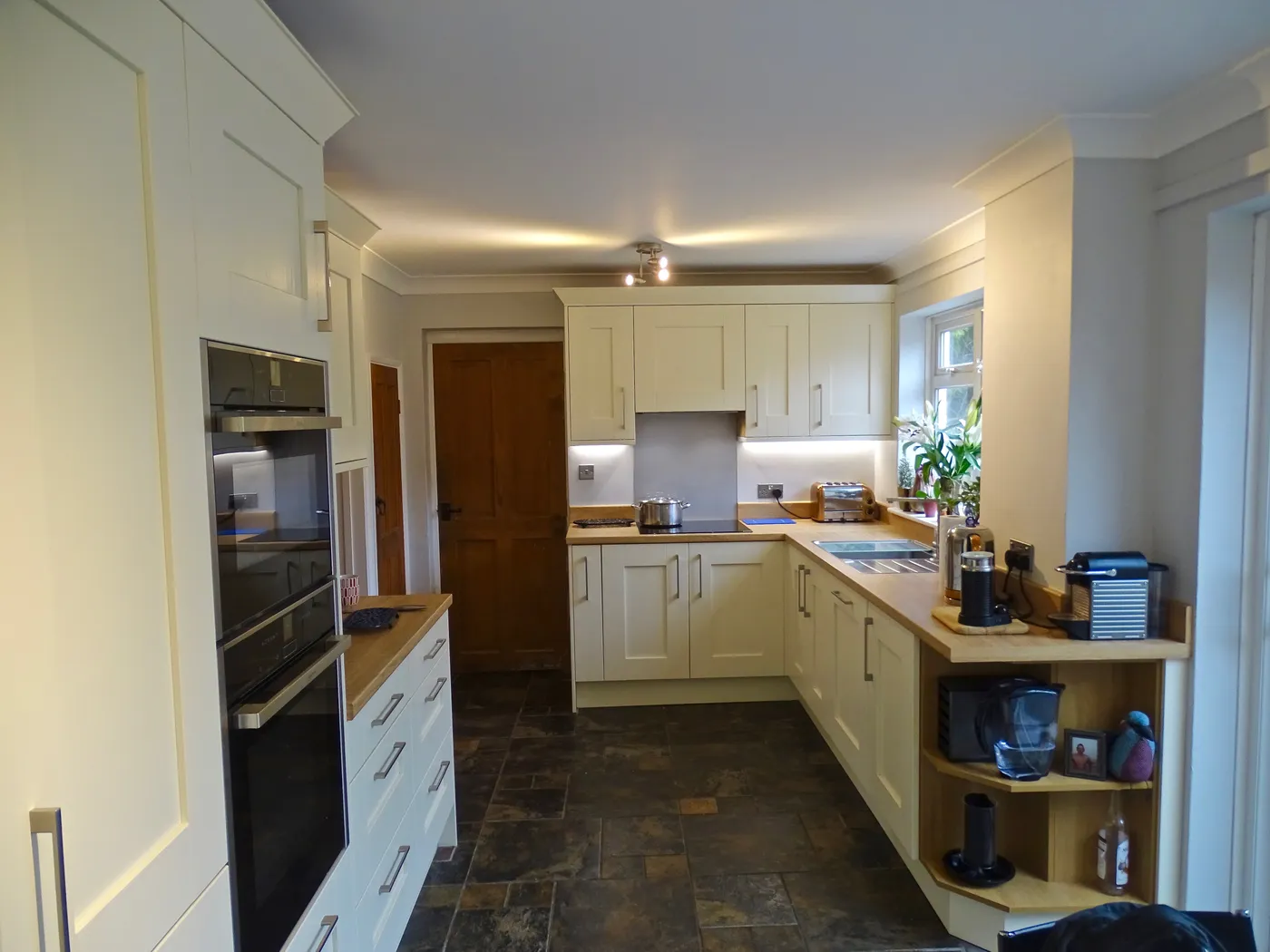 Cream Shaker Kitchen with Tall Appliance Housing — project photo