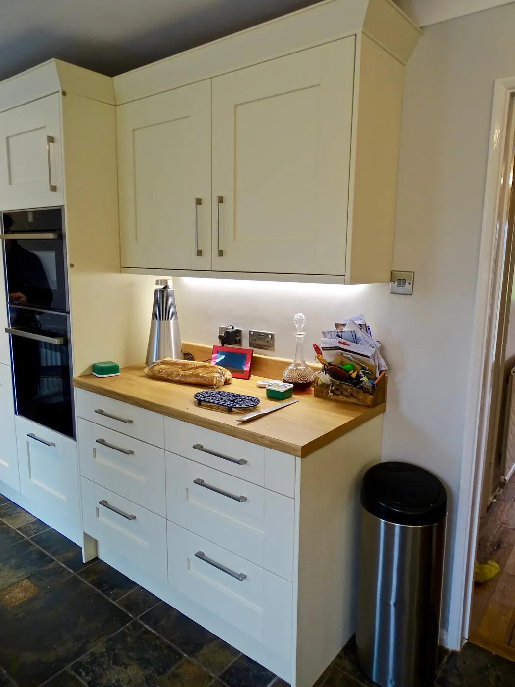 Cream Shaker Kitchen with Tall Appliance Housing — project photo