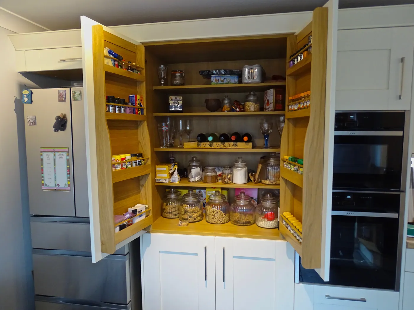 Cream Shaker Kitchen with Tall Appliance Housing — project photo