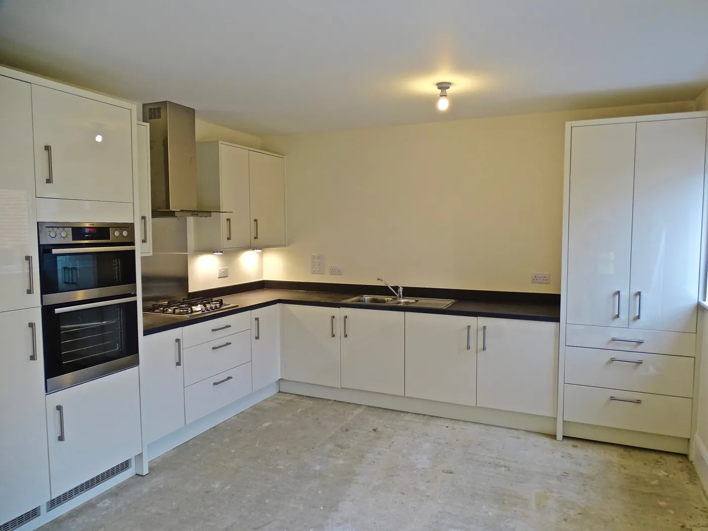 High-Gloss White Kitchen Installation