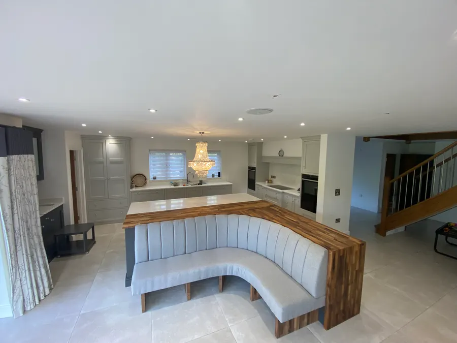 Open-plan kitchen with banquette