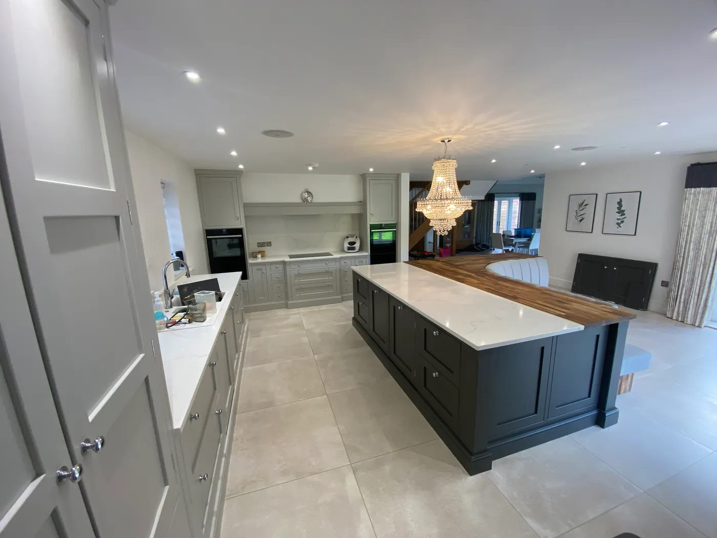 Open-Plan Kitchen Island with Banquette Seating — project photo