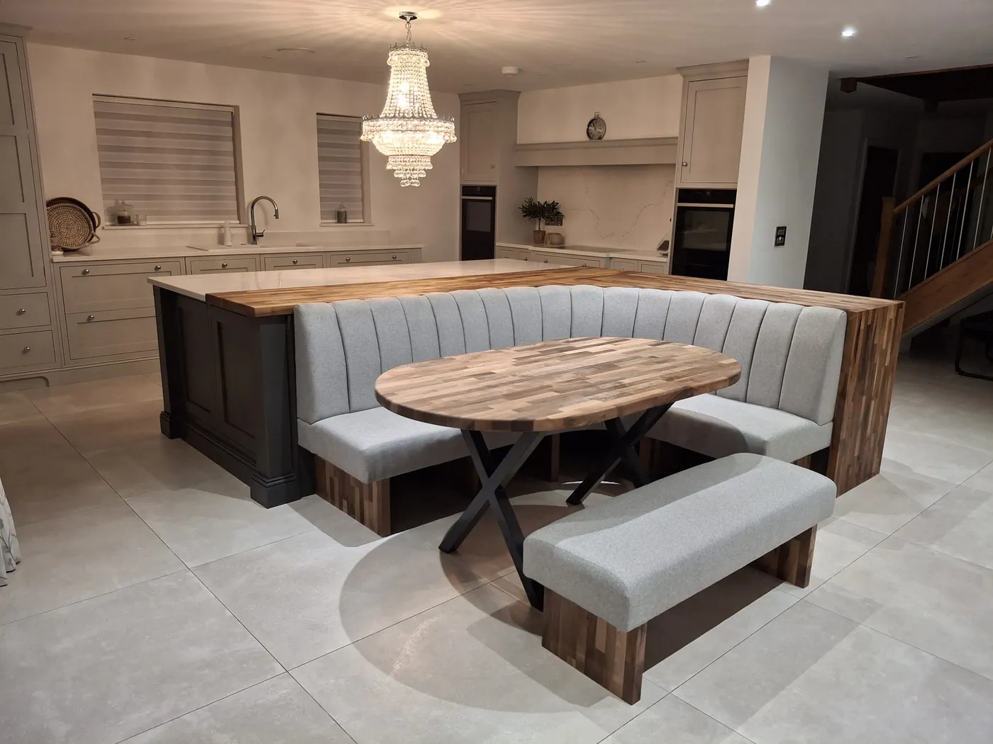 Open-Plan Kitchen Island with Banquette Seating — project photo