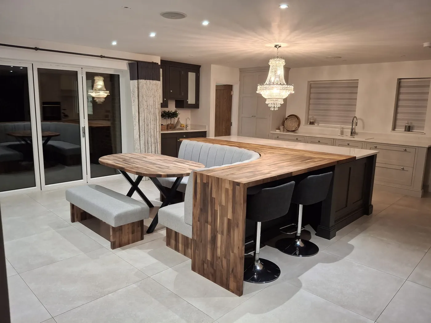 Open-Plan Kitchen Island with Banquette Seating — project photo