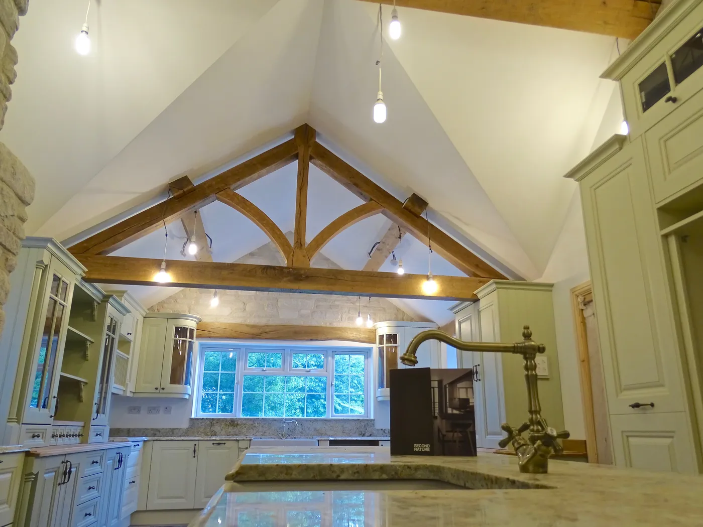 Sage Green Farmhouse Kitchen with Oak Beams — project photo