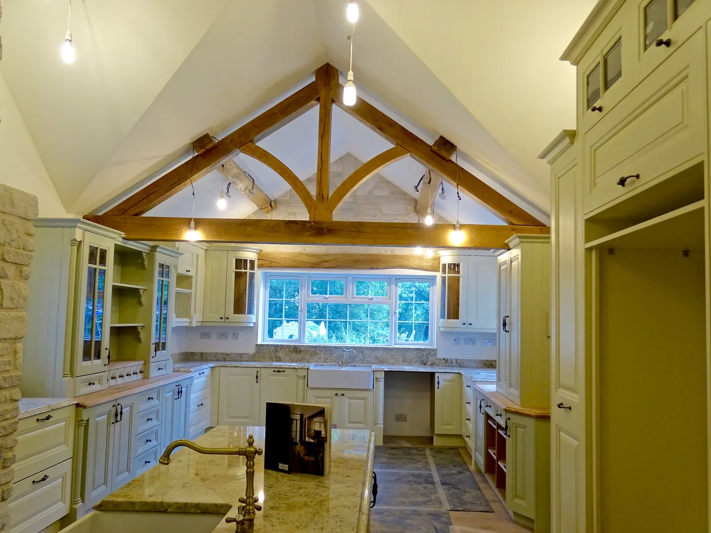 Sage Green Farmhouse Kitchen with Oak Beams — project photo