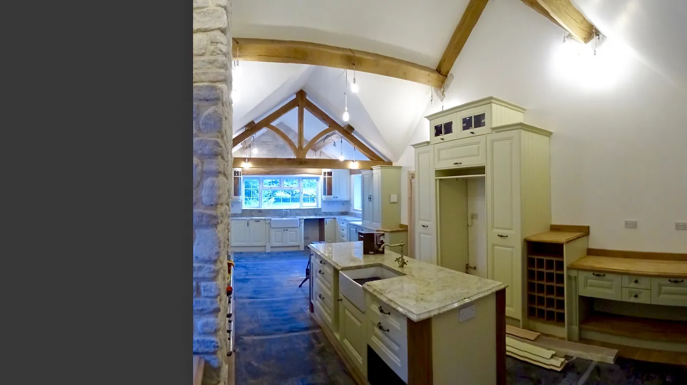 Sage Green Farmhouse Kitchen with Oak Beams — project photo