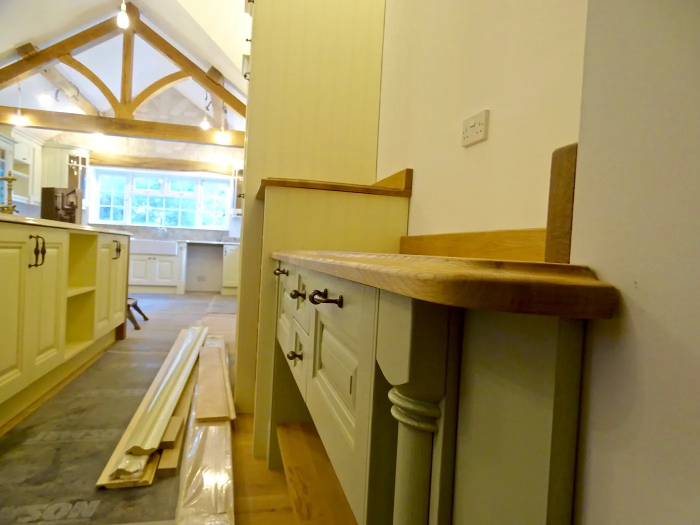 Sage Green Farmhouse Kitchen with Oak Beams — project photo