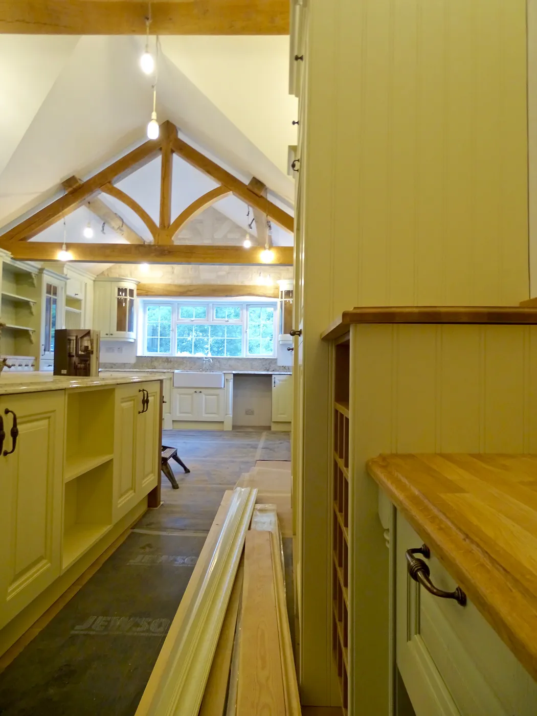 Sage Green Farmhouse Kitchen with Oak Beams — project photo