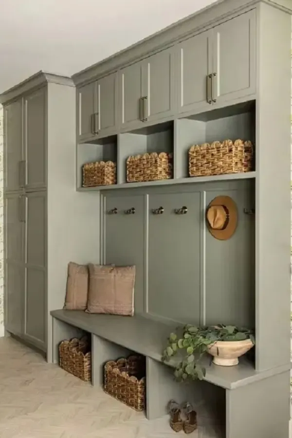 Boot room style hall joinery with bench, hooks and shoe cubbies