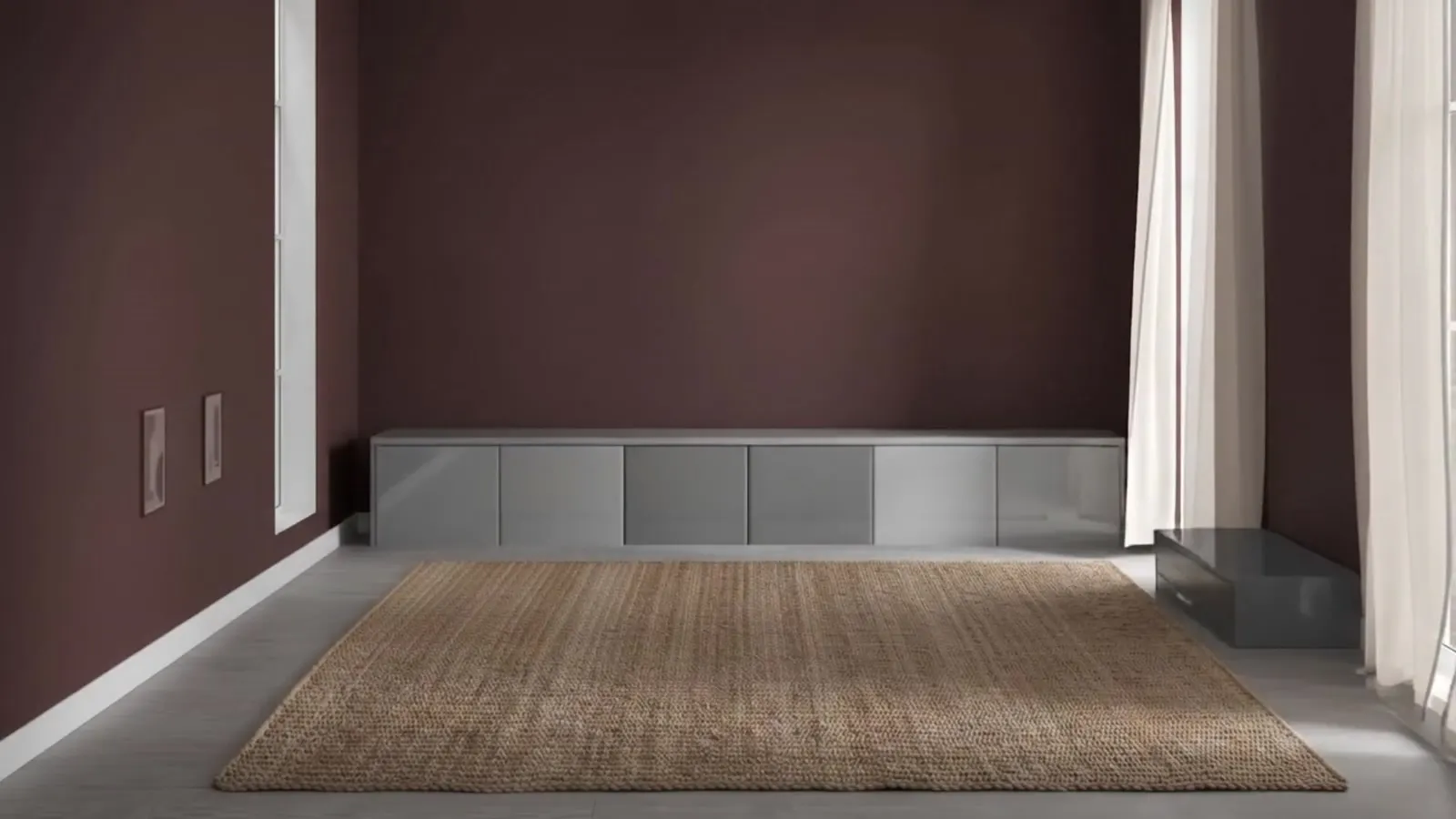 Gloss grey fitted wardrobes with matching chest of drawers in a bedroom