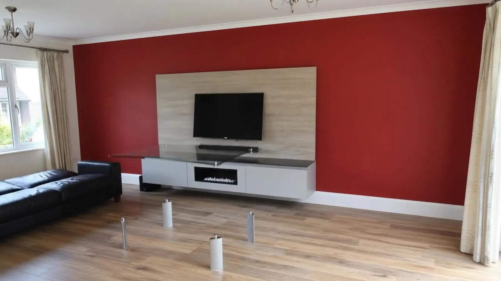 Living room media wall with timber TV panel, floating console and feature wall